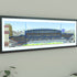A framed panoramic print of a Chelsea’s Stamford Bridge stadium, displayed on a light gray wall.