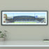A framed panoramic print of a Chelsea FC’s Stamford Bridge stadium, displayed on a light gray wall.