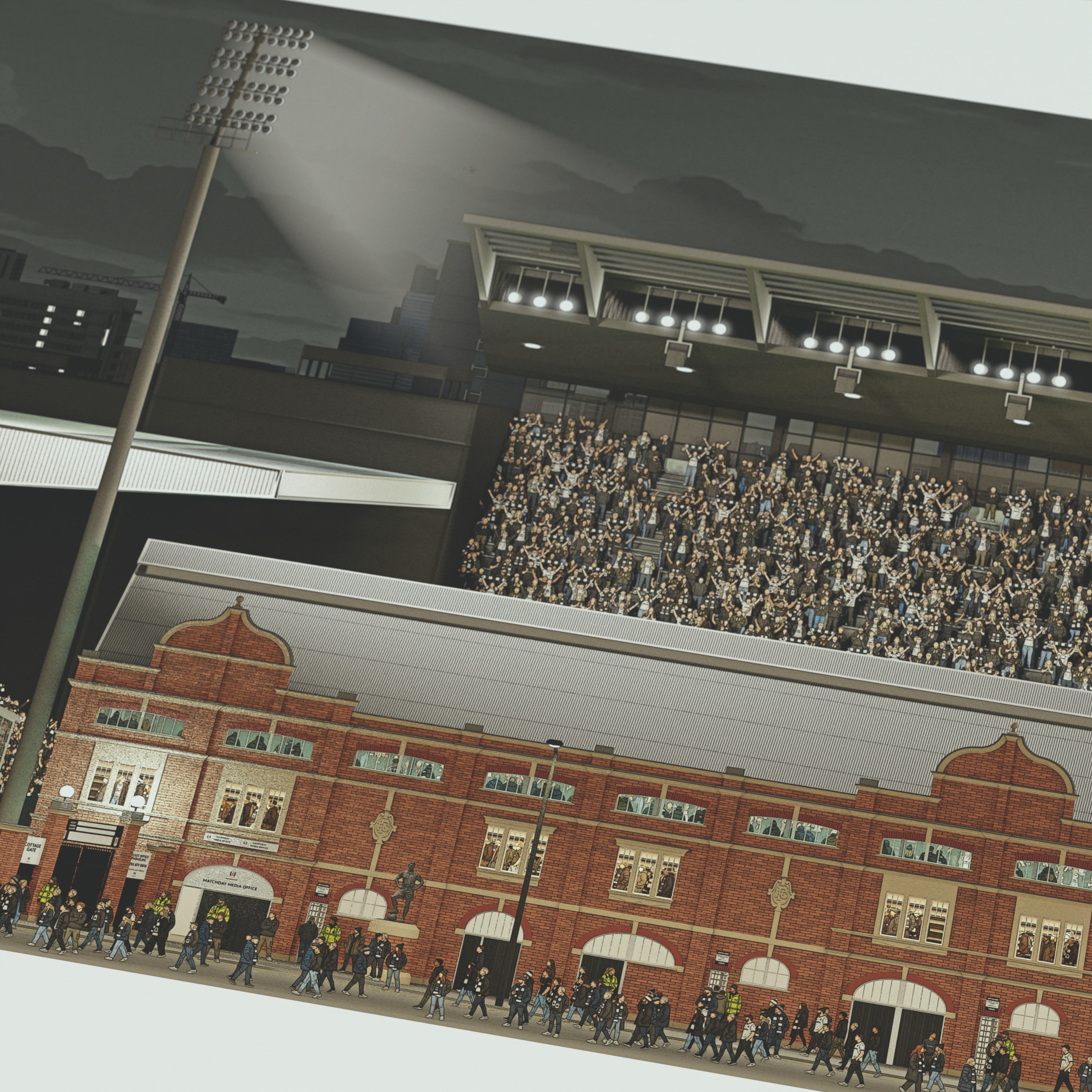 A close up of a framed panoramic print of a Fulham's Craven Cottage stadium.