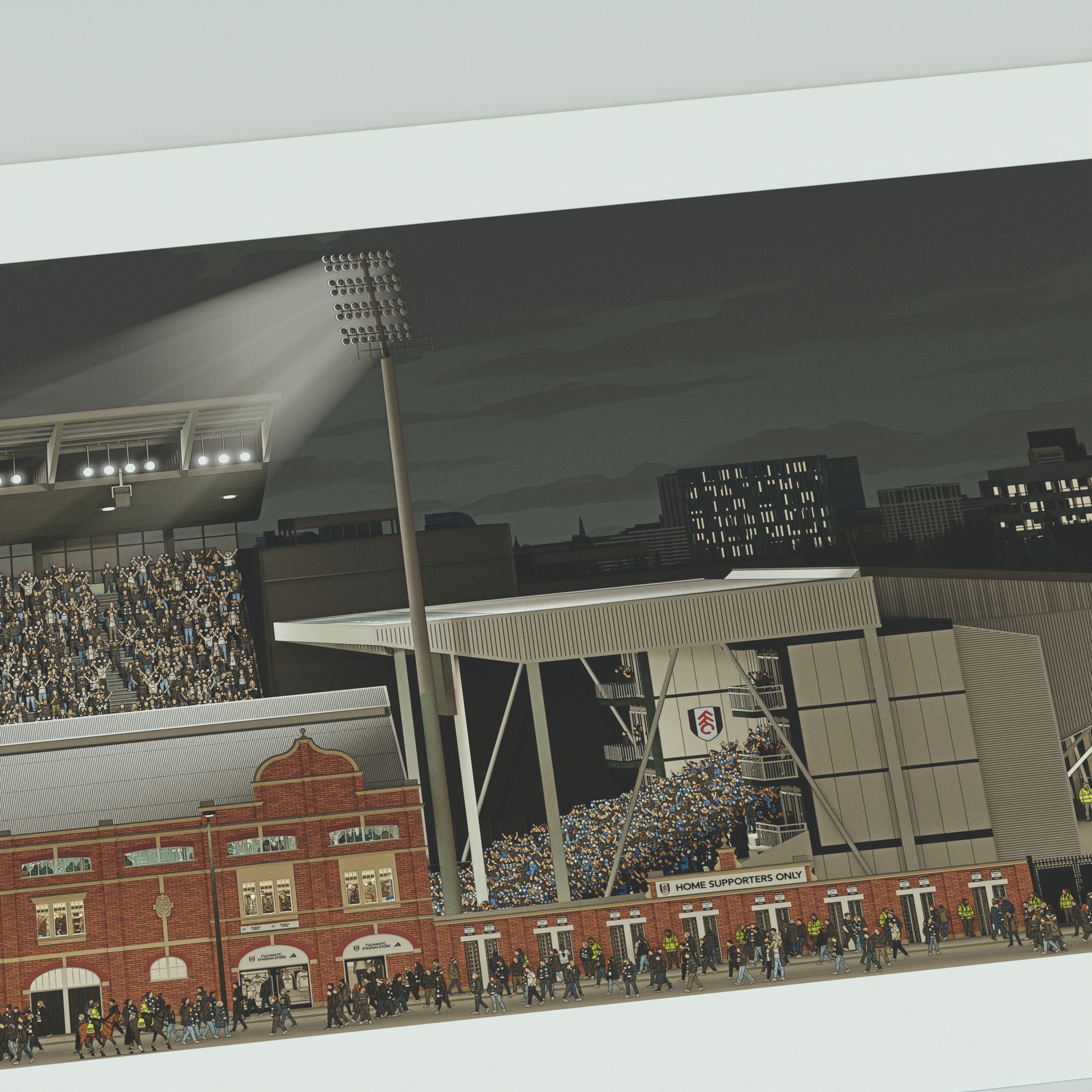 A close up of a framed panoramic print of a Fulham's Craven Cottage stadium.