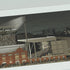 A close up of a framed panoramic print of a Fulham's Craven Cottage stadium.