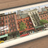 Panoramic illustrated New York tenements with bustling street life